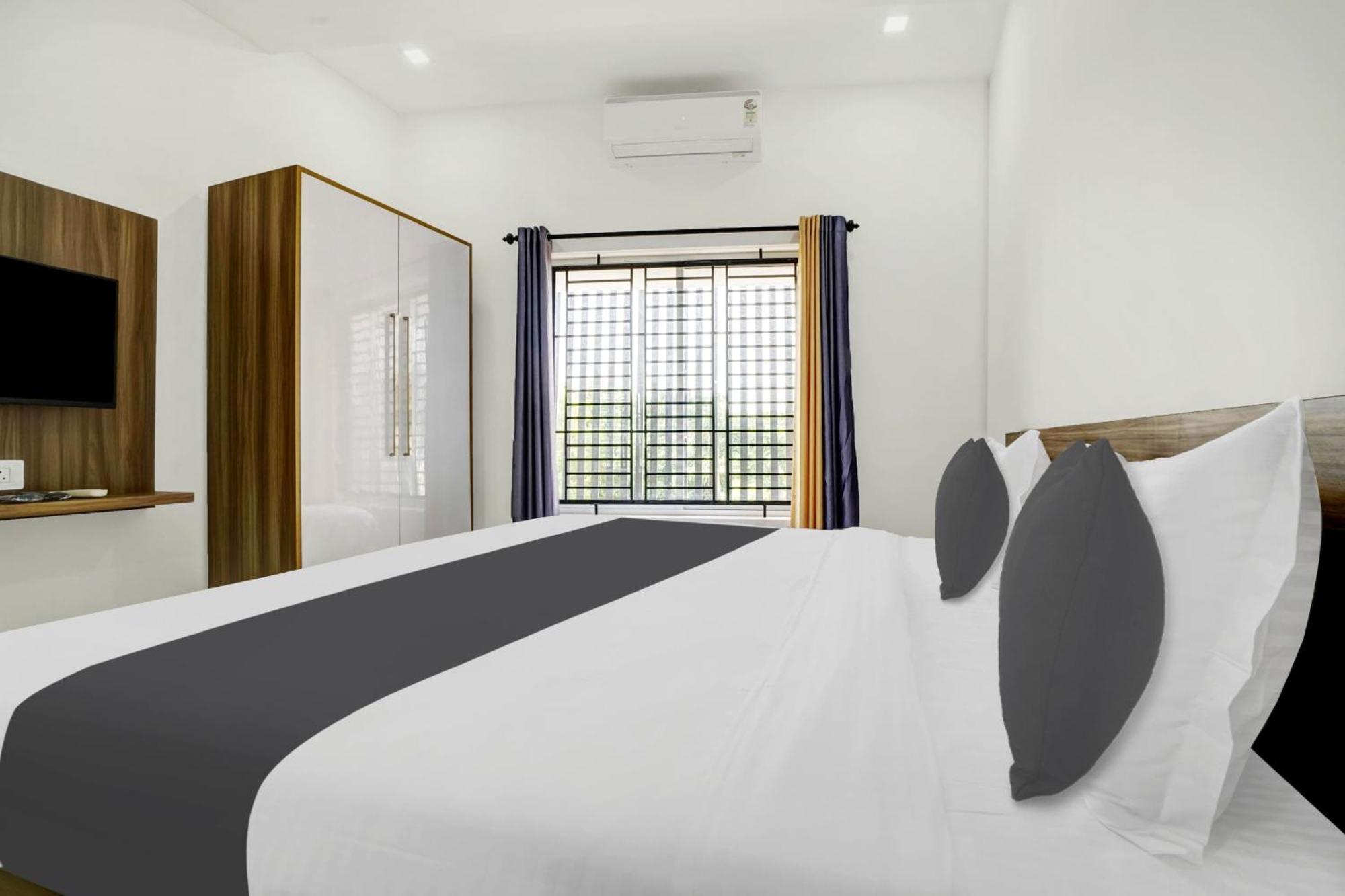 Hotel O Grand Parassini Pāppinisseri 外观 照片