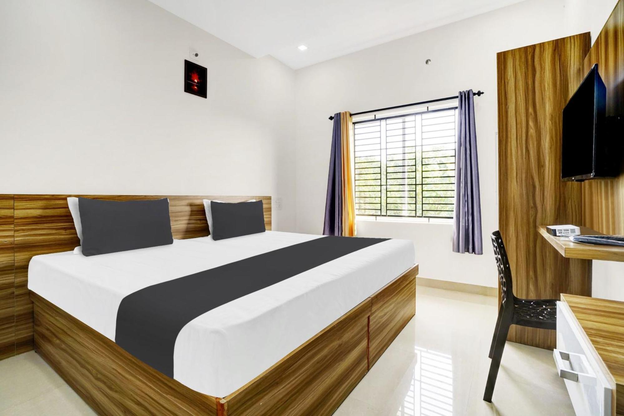 Hotel O Grand Parassini Pāppinisseri 外观 照片